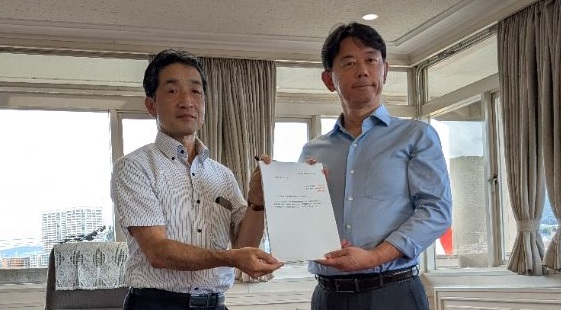 答申手交式
